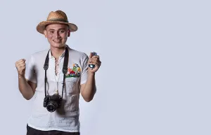 Tourist Photography Drucke: Tourist in a hat with a camera