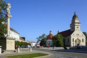 Historic City Center Slovakia Drucke: Town square with a statue in the foreground