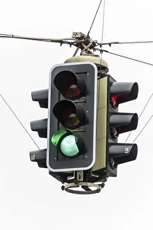 Deserted Street Scene Drucke: A traffic light with a green light