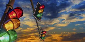 Deserted Street Scene Drucke: Traffic lights over urban intersection