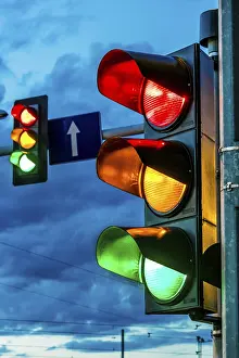 Deserted City Street Drucke: Traffic lights over urban intersection. Red light