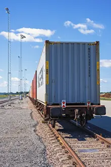 Drucke von Zug mit Containern auf einem Ladegleis, Schweden Eisenbahn Drucke: Zug mit Containern auf einem Ladegleis, Schweden.