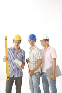 Safety Helmets Drucke: Three trainees with helmets, pliers