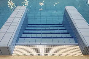 Serene Ocean Views Drucke: Tranquil pool steps gently leading into the refreshing