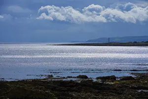Tranquil Seascape Drucke: Tranquil seascape with soft sunlight and clouds