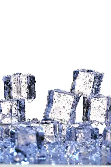 Crystal Clear Ice Drucke: Transparent cold ice cubes on a white background