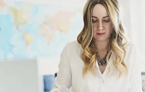 One Person Office Space Drucke: Travel agent working with documents at office