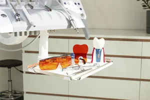 Medical Care Equipment Drucke: On the tray are various dental instruments