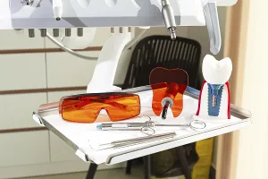 Clinical Dental Settings Drucke: On the tray are various dental instruments