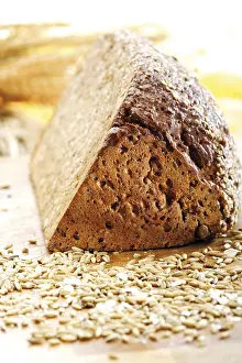 Pastry And Baked Goods Drucke: Triangular loaf of wholegrain bread