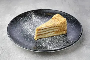 Gourmet Food Drucke: Triangular piece of classic Napoleon cake on a plate