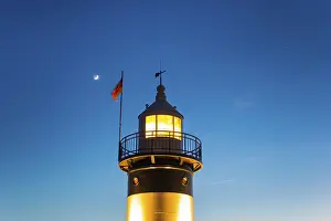 World Heritage Site Germany Drucke: Upper segment of an illuminated lighthouse at night