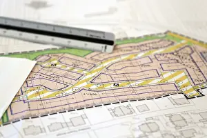 New Construction Site Drucke: Urban development plan on a desk