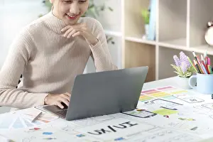 Single Person Workspace Drucke: UXUI designer analyzing digital designs