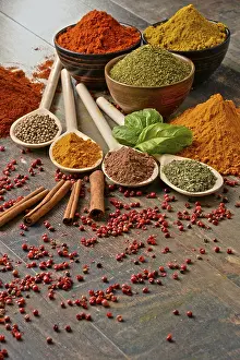 Kitchen Table Setup Drucke: Variety of spices on kitchen table