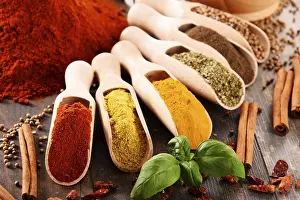 Kitchen Table Setup Drucke: Variety of spices on kitchen table