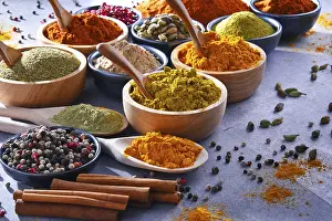 Kitchen Table Setup Drucke: Variety of spices on kitchen table