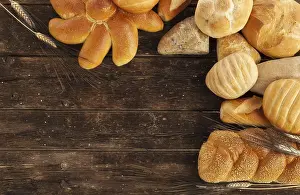 Baked Goods Images Drucke: Variety types of bread on wood table