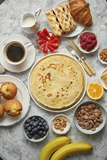 Flat Lay Photography Drucke: Various breakfast ingredients placed on stone table