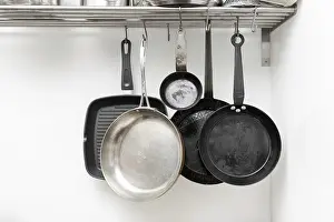 Kitchen Tool Photography Drucke: Various pans in different sizes and forms for cooking