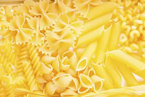 Food Photography Background Drucke: Various pasta types as a background on the table
