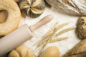 Bread And Pastry Still Life Drucke: Various types of bread. Pile of flour