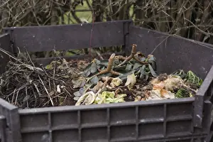 Sustainable Gardening Practices Drucke: Vegetable and garden waste in an open composter