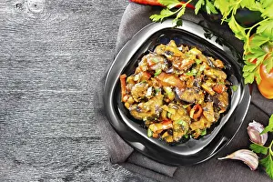 Wooden Board Background Image Drucke: Vegetable ragout with eggplant