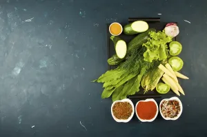 Diverse Vegetable Selections Drucke: THE VEGETABLES IN THE BOX ON THE STONE A DARK BACKGROUND