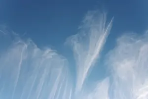 Nice Weather In Germany Drucke: Veil clouds move across a clear blue sky and create a delicate