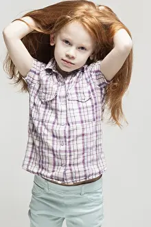 Caucasian Female Child Photo Drucke: Vertical picture, isolated on grey