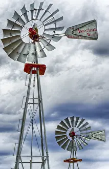 Wind Power Generation Drucke: A vertical view of two wind wheels or wind pumps up close