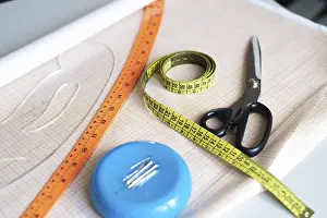 Handmade Craftsmanship Drucke: A vibrant collection of sewing essentials including scissors