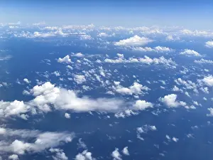 Cirrocumulus Cloud Types Drucke: View from airplane of white light cluster cloud Cirrocumulus cloud