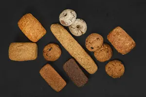 Freshly Baked Goods Photography Drucke: Top view of assortment of artisan bread made of different types of grain with different shapes