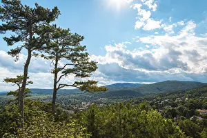 Uninhabited Austrian Village Drucke: View over Baden under a cloudy sky