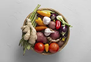 High Quality Photo Drucke: Top view basket with assortment vegetables