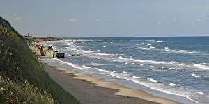 Northern Europe Coastline Views Drucke: View of the beach with gentle waves lapping against the shore
