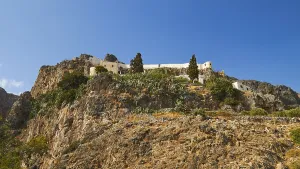 Greece Rocky Coastline Drucke: View from below, rock monastery