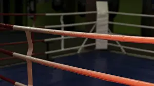 Deserted Sports Stadium Drucke: Front view empty boxing ring