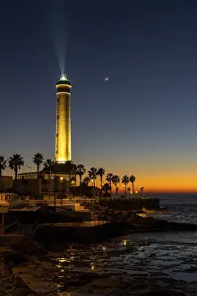 Atlantic Ocean Sunset Drucke: A view of the Chipiona lighthouse just after sunset