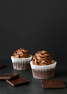 Chocolate Cake Photography Drucke: Front view delicious cupcake concept