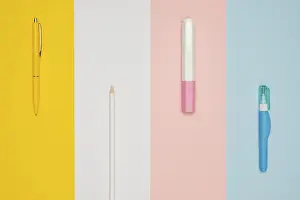 Colorful Stationery Set Drucke: Top view different office pens