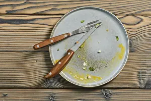 Deserted Breakfast Table Drucke: Top view of empty dirty plate on a table