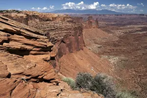 Deserted Valley Scene Drucke: View of eroded landscape from Mesa Arch