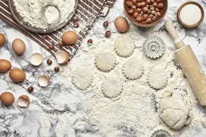 Baking Ingredients Drucke: Top view of a kitchenware and baking ingredients on a marble table background
