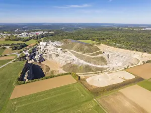 Agricultural Land Use Aerials Drucke: View of a large quarry with surrounding fields and forests
