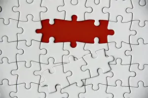 Empty White Background Photo Drucke: Top view of missing jigsaw puzzle