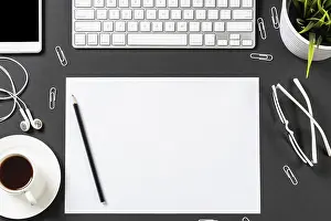 Contemporary Architecture Drucke: Top view of modern workplace with blank paper sheet