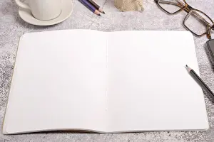 Home Office Setup Drucke: Top view of a notebook with blank pages